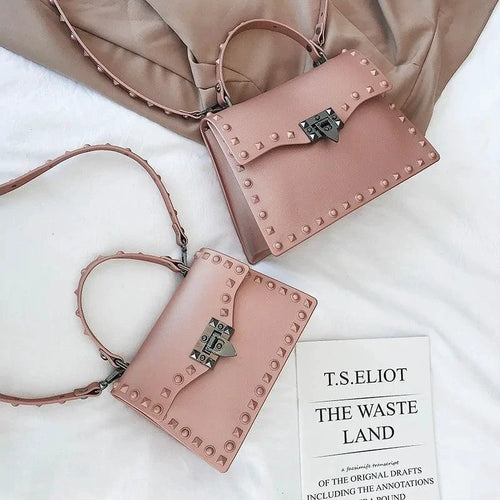 Mandotos chic PU leather sling bag with adjustable strap and minimalist design, ideal for casual or evening use.