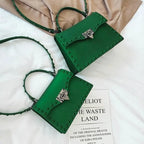Mandotos chic PU leather sling bag featuring a sleek design, adjustable strap, and compact size for versatile everyday use.