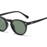 Mandotos chic round UV-block sunglasses with black frames and dark tinted lenses, stylish and protective for sunny days.