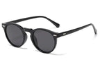 Mandotos chic round UV-block sunglasses with black frames and dark lenses, stylish and protective for sunny days.