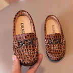 Chic toddler leather shoes by Mandotos featuring soft brown leather, stylish design, and comfortable fit for young children.