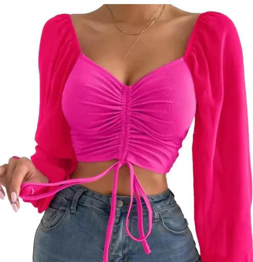 Mandotos chic V-neck balloon sleeve crop top in stylish design, featuring a fitted waist and elegant neckline.