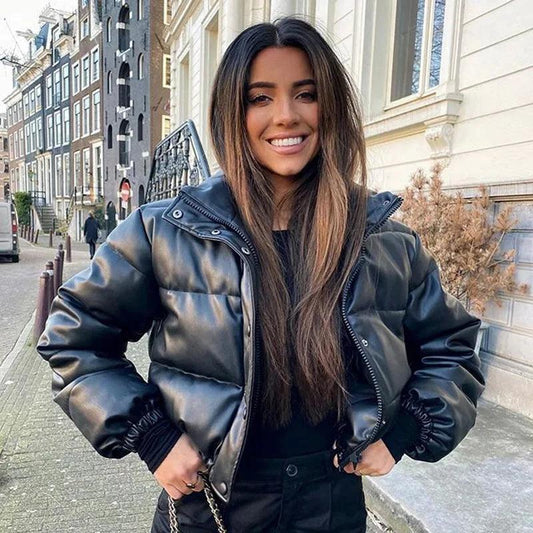 Mandotos chic winter PU leather jacket displayed on a hanger, featuring a stylish design and smooth black leather texture.