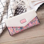 Mandotos women's leather clutch wallet and card holder with sleek design and multiple card slots, suitable for elegant everyday use.