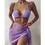 Mandotos ChicWave elegant chiffon sarong draped over a beach chair, showcasing lightweight, flowy fabric perfect for beach style.