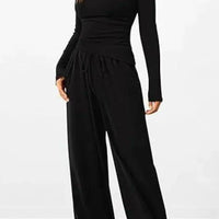 Mandotos City Comfort Asymmetrical Ensemble featuring a stylish top and matching pants in urban fashion style.