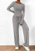 Mandotos City Comfort Asymmetrical Ensemble featuring a stylish, modern outfit with layered, comfortable fabric in neutral tones.