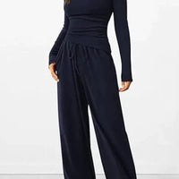 Mandotos City Comfort Asymmetrical Ensemble featuring a stylish, modern design with comfortable fabric and unique asymmetrical details.