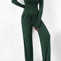 Mandotos City Comfort Asymmetrical Ensemble featuring a stylish, modern design with layered fabrics and unique pattern details.