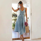 Mandotos CitySleek denim midi dress displayed on a mannequin, showcasing a stylish, fitted design with a classic denim finish.