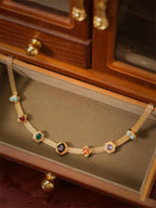 Vintage 14K gold choker necklace from MANDOTOS featuring a classic, elegant design with a polished finish.