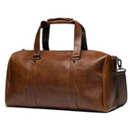 Mandotos Classic Leather Duffel Bag with sturdy handles and spacious interior, perfect for travel and weekend trips.