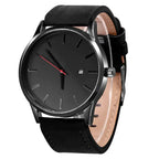 Mandotos Classic Leather Timepiece featuring a leather strap and round watch face with minimalist design.