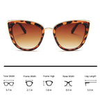 Mandotos Cleo Cat Eye Shades with black frames and tinted lenses, stylish sunglasses for women.