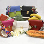 Mandotos compact leather crossbody handbag in Cabernet color with adjustable strap and sleek design.