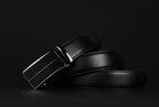 Contemporary MANDOTOS leather belt with sleek design and polished finish, shown in close-up view.