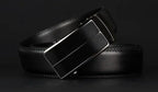 Mandotos contemporary leather belt with a sleek, stylish design featuring a silver buckle and smooth brown leather strap.