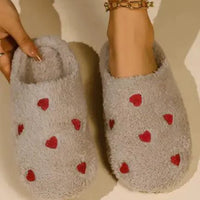 Mandotos Cushy Heart Top Fluffy Slippers with soft, plush material and heart design for cozy comfort.