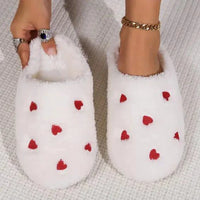 Mandotos Cushy Heart Top Fluffy Slippers with soft, plush material and heart design for cozy comfort.