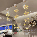 Mandotos Christmas 3-piece LED star hanging lights with suction cups, battery-powered home decor lighting display.