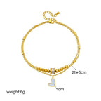 Mandotos boho love heart ankle chain with double layers, charm tassels, and leg chain design for women’s jewelry and party accessories.