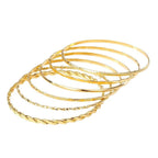 Six-piece MANDOTOS bohemian metal chain bracelet set for women with geometric gold-colored thick link bangles on a white background.