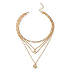 Mandotos chunky gold layered necklace with coin pendant and sun charm, designed for women, featuring bold, stylish jewelry.