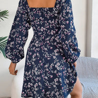 Mandotos floral print red lantern sleeve dress with square neck, tie waist, and long A-line silhouette.