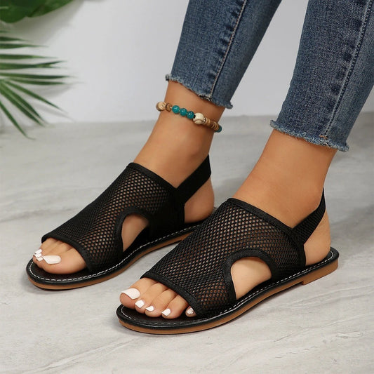 Mandotos mesh sandals for women and men, breathable flat summer shoes ideal for beach and casual wear.