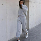 Mandotos women's autumn and winter casual hoodie coat with sports suit, featuring a cozy, stylish design for cold weather wear.
