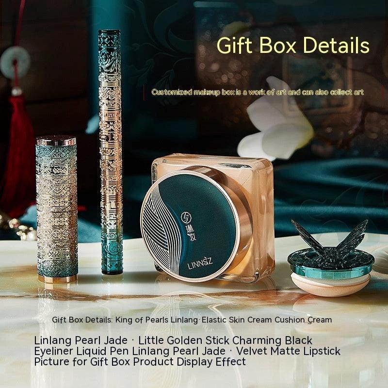 Mandotos Oriental Beauty Co. Chinese-inspired makeup set with elegant palette and bold colors, featuring eyeshadows, blush, and brushes.