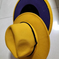 Mandotos stylish fedora hat with a color-blocked wool design, perfect for a chic and trendy look.