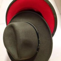 Mandotos stylish fedora hat with a trendy color-blocked wool design, perfect for a chic and fashionable look.