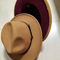 Mandotos stylish fedora hat with a color-blocked wool design, perfect for a chic, trendy look.