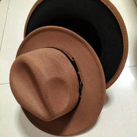 Mandotos stylish fedora hat with a trendy color-blocked wool design, perfect for a chic and fashionable look.