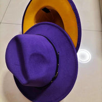 Mandotos stylish fedora hat with a trendy color-blocked wool design, perfect for a chic and fashionable look.