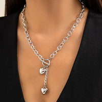 Mandotos thick chain lock and key pendant necklace featuring trendy fashion jewelry, showcasing a bold and stylish accessory.