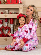 Matching Valentine’s Day love print pajamas for parent and child by MANDOTOS, featuring cozy, festive sleepwear sets.