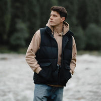 White duck down vest by Mandotos, men's ultra-effective three-proof jacket with lightweight insulation and durable fabric.