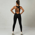 Mandotos women's sleeveless yoga jumpsuit with V-shaped back, stretch fitness tights, ideal for running and active sportswear.