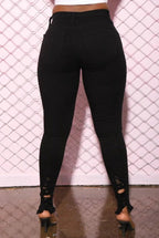 Mandotos denim pencil pants for women with slim fit, ripped holes, stretch fabric, long length, and tapered feet.