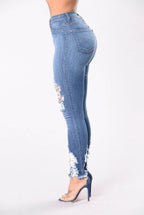Mandotos denim pencil pants for women, slim long trousers with ripped holes and stretch fabric for a stylish, fitted look.