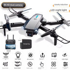 Mandotos HD drone for aerial photography, remote control quadcopter with camera, black and white design in flight.