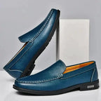 Mandotos Eco-Chic Leather Loafers showing classic slip-on style with sleek leather finish and stitching details.