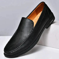 Mandotos Eco-Chic Leather Loafers shown in brown with sleek design and comfortable slip-on style.
