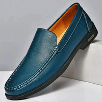 Mandotos Eco-Chic leather loafers in classic brown with sleek design and stitching, perfect for casual or formal wear.