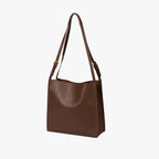 Mandotos eco-friendly vegan leather tote bag with a stylish, sustainable design, featuring spacious interior and sleek black finish.