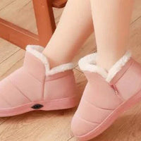 Mandotos electric heated shoes with insulated design and heating elements for warmth and comfort.