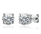 Elegant 18K gold and silver moissanite stud earrings by MANDOTOS, showcasing sparkling gemstones and a classic design.