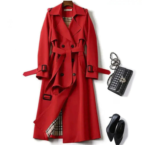 Mandotos elegant classic trench coat displayed on a hanger, featuring a tailored fit and traditional design.